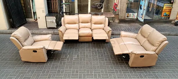 Beige 3-seater reclining leather sofa with two matching recliners - used