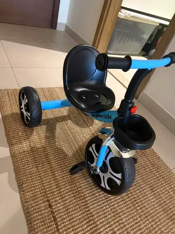 Lightweight toddler tricycle with front basket — good condition