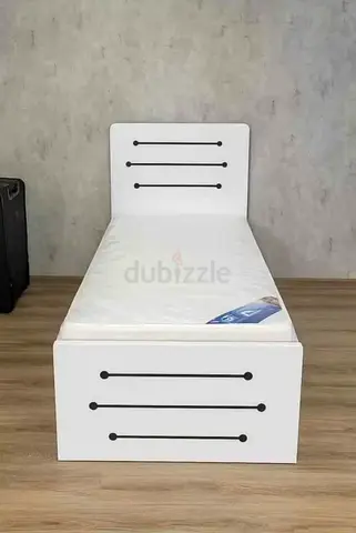 Single white wooden bed frame with mattress - simple modern design