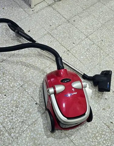 Red canister vacuum cleaner - working condition