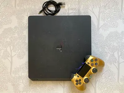 Sony PlayStation 4 Slim (PS4) with Controller, GTA 5 Disc & 10 Games