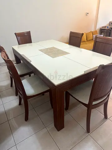 Marble-top Wooden dining table with 6 chairs - solid finish, good condition