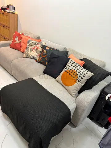 Large Beige Corner Sofa with Cushions – AED 1,400