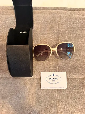 Prada white frame sunglasses with case and authenticity card