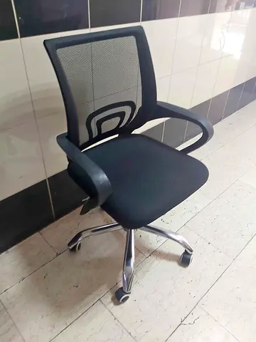 Black ergonomic mesh office chair with wheels