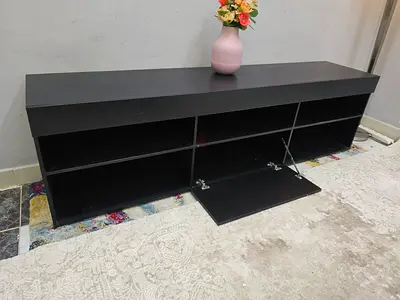 Long low black TV console / media unit with storage
