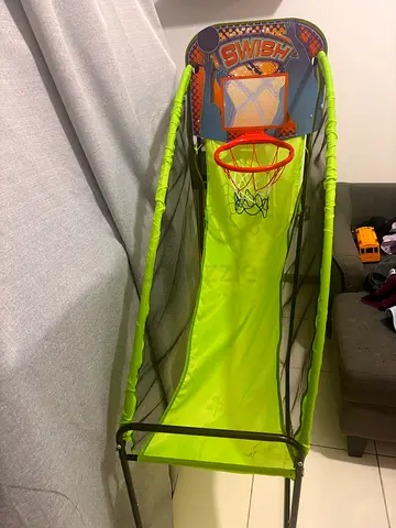Portable kids basketball hoop with ball return
