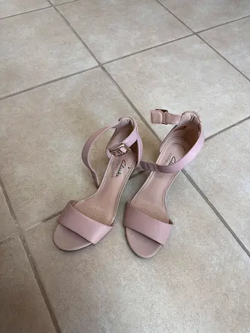 Light pink Clarks women's heeled sandals