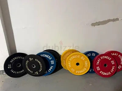 Set of Color-Coded Bumper Weight Plates (Various KG) - Good Condition