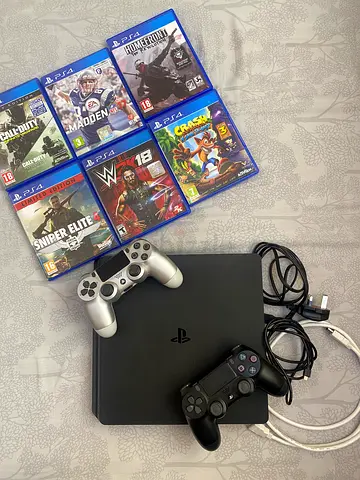 Sony PS4 Slim 500GB with 2 DualShock 4 Controllers & 6 Games