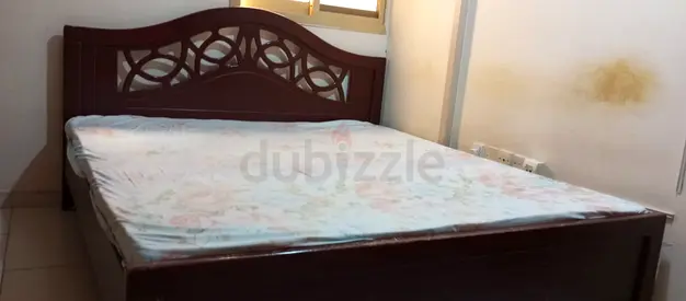Wooden double bed frame with headboard - good condition
