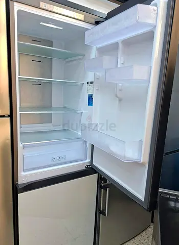 Almost-new Stainless Steel Refrigerator - Spacious, Good Condition
