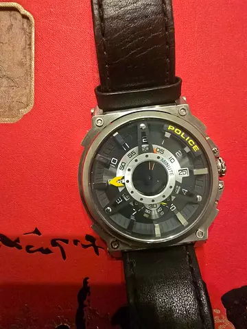 Police men's analog watch with leather strap - used