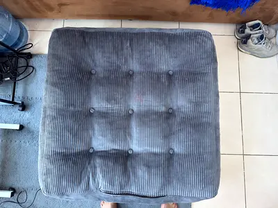 Grey tufted square sofa cum bed