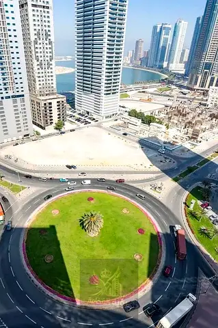 Special Rental Offer in Al Khan, Sharjah. A spacious two-bedroom apartment with a living room, two