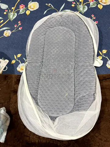 Portable baby nest bassinet with mosquito net - light grey