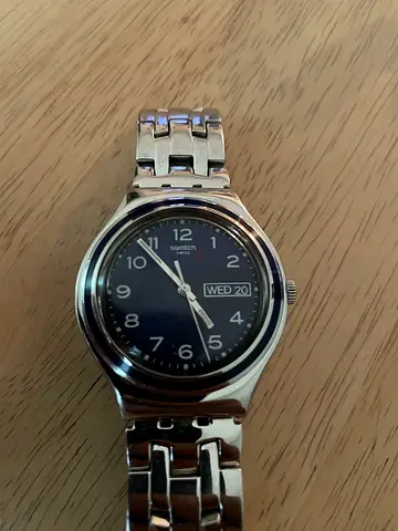 Swatch Men's stainless steel analog watch with day-date