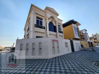 corner villa  for sale at Ajman  -Al Yasmeen area  the Villa 3200  ( 5  Master room +big court + big  Majlis +big Hall +maid room