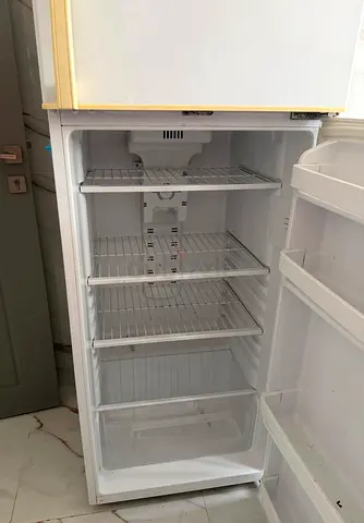 Used double -door refrigerator with freezer compartment - clean interior