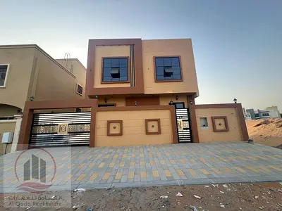 Villa  for sale at Ajman  -Al Heloi area  the Villa 3200 sqft  G + 1  ( 5  Master room +big court + big  Majlis +big Hall +maid room)