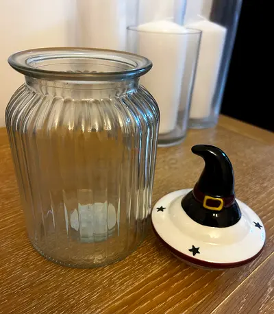 Glass Ribbed Jar with Decorative Witch Hat Lid