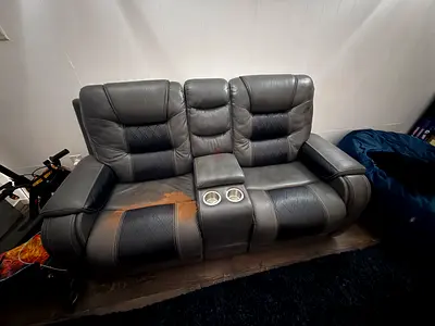 Recliner sofa works perfectly, but with somewhere and tear