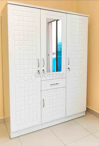 Brand new 3door cabinet White colour made in UAE