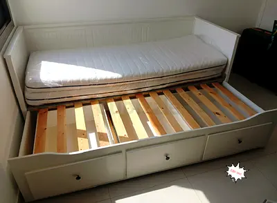 IKEA Hamnes Day bed with 3 storage drawers underneath and with 2 IKEA mattresses is available