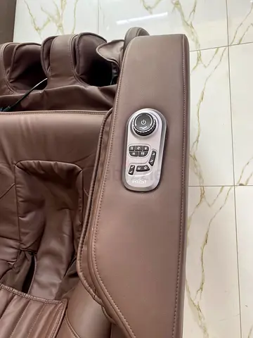 Used full body electric massage chair - brown leather armrest with controls