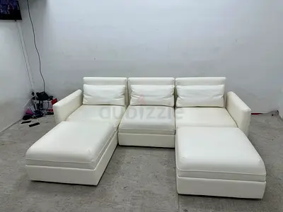 Leather IKEA sofa under storage