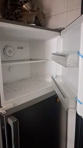 Used refrigerator (freezer compartment shown) - good working condition