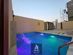 Move-in ready villa for sale on Sheikh Mohammed bin Zayed Road, featuring 5 master bedrooms, at an a