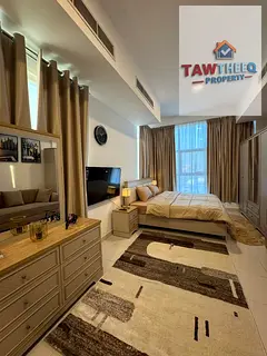 Furnished studio with a separate kitchen; second-time occupancy (like-new condition), includes new f