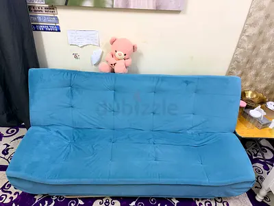 Blue convertible futon sofa bed - good condition