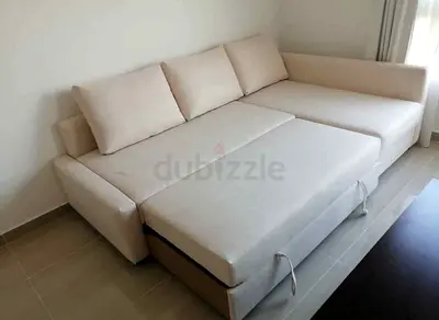 Ikea frighten L shape beige color sofa with storage space available