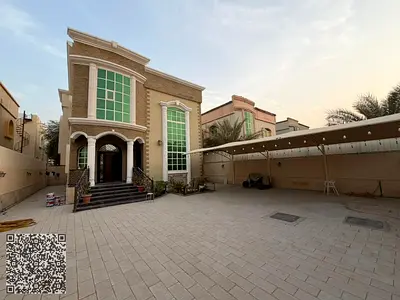 Villa for annual rent, featuring 5 rooms and an area of ​​5,000 square feet, located in Al Muwaihat