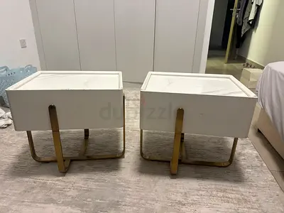 2 white nightstands/bedside tables with gold legs