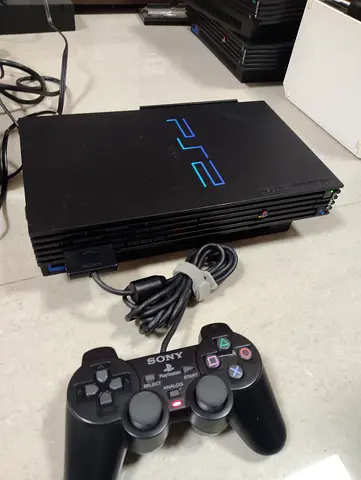 Playstation 2 Fat with one controller+ 350 games loaded