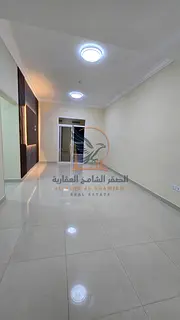 Two-bedroom apartment with a living room for annual rent in Ajman, Al Jurf 3, near Al Qabail Center.