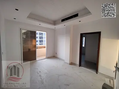 Apartment for rent in Ajman, Al Alia area. First occupancy, featuring two rooms, a living room, and 3 bathrooms.