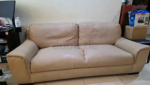 Beige 3-seater leather sofa — used,