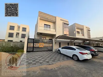 Villa for sale in Al Zahia, Ajman. Includes electricity and air conditioning. Features 5 master bed