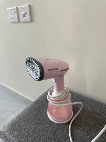 Doscher handheld garment steamer pink and white
