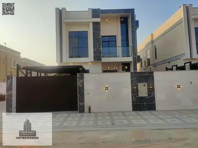 Super-deluxe villa for sale in Al Muwaihat 3, Ajman | 5 master bedrooms | Outdoor seating area and garden | AED 1,980,000