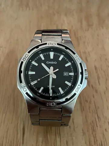 Casio men's stainless steel analog watch with black dial