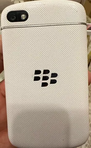 White BlackBerry smartphone in average condition