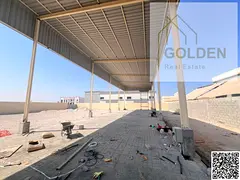 65 kW Power – Industrial Yard with Open Warehouse for Rent in Umm Al Quwain on the Main Road