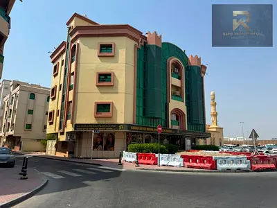 عمارة سكني تجاري للبيع في منطقة الراشدية 1 عجمان قريبة من الخدمات