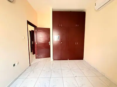 CHEAP PRICE 1BHK WITH WARDROBE ON ROAD BUILDING IN MUWAILEH