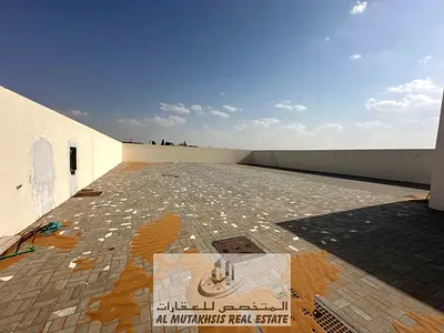 Industrial land for rent in Al Jajaa, Sharjah Land area is 10,000 feet The land is fenced for water and electricity And office Interlock floor The price is 80 thousand